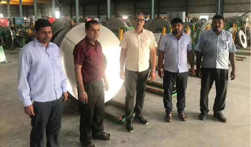 Mr Bansal along with his workers at shop floor