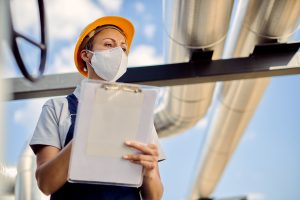 Female Worker with Mill Test Documents